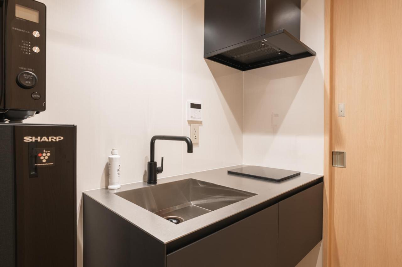 Grand Base Hakata Gofuku Aparthotel Fukuoka  Bagian luar foto