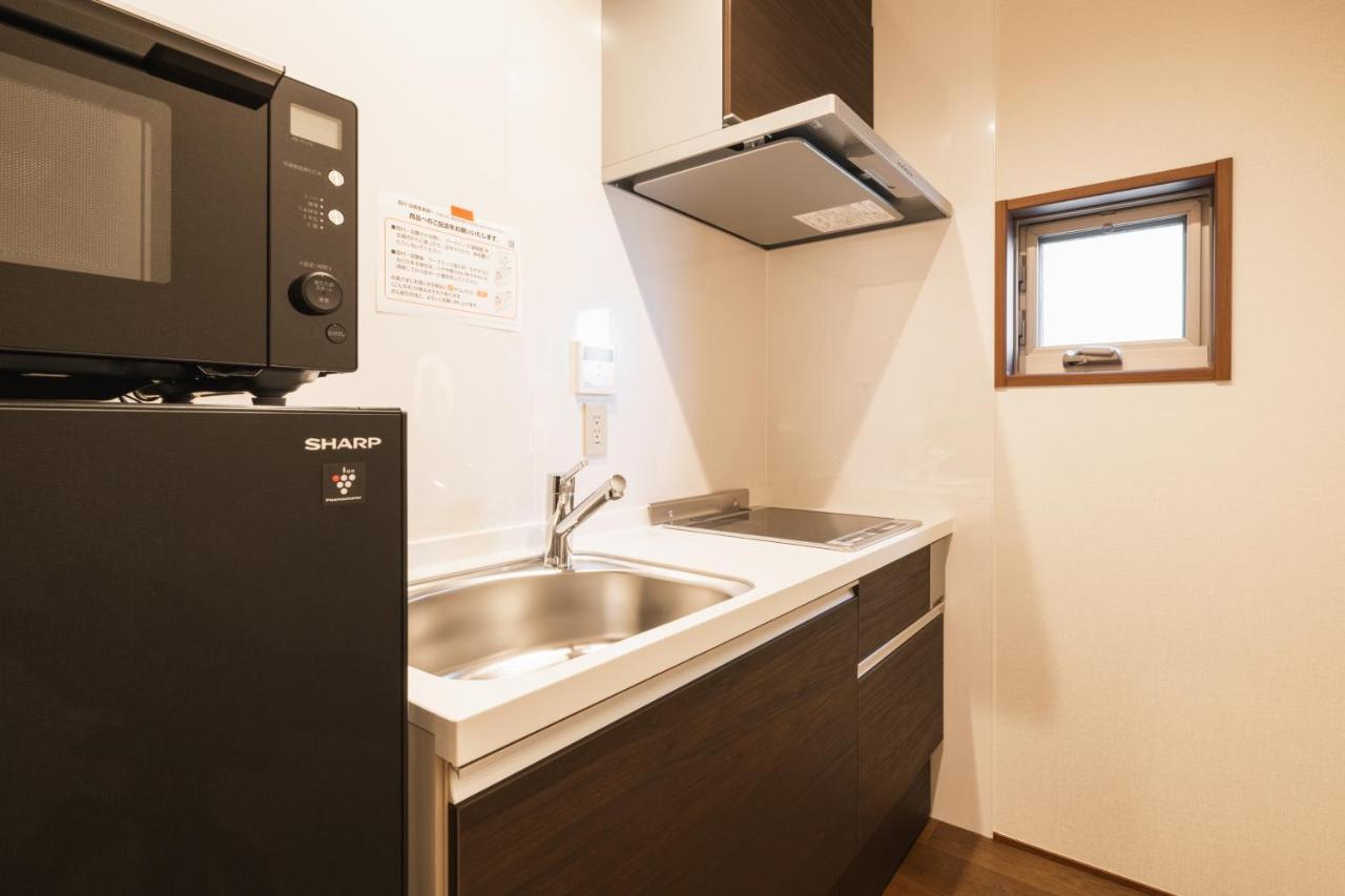 Grand Base Hakata Gofuku Aparthotel Fukuoka  Bagian luar foto