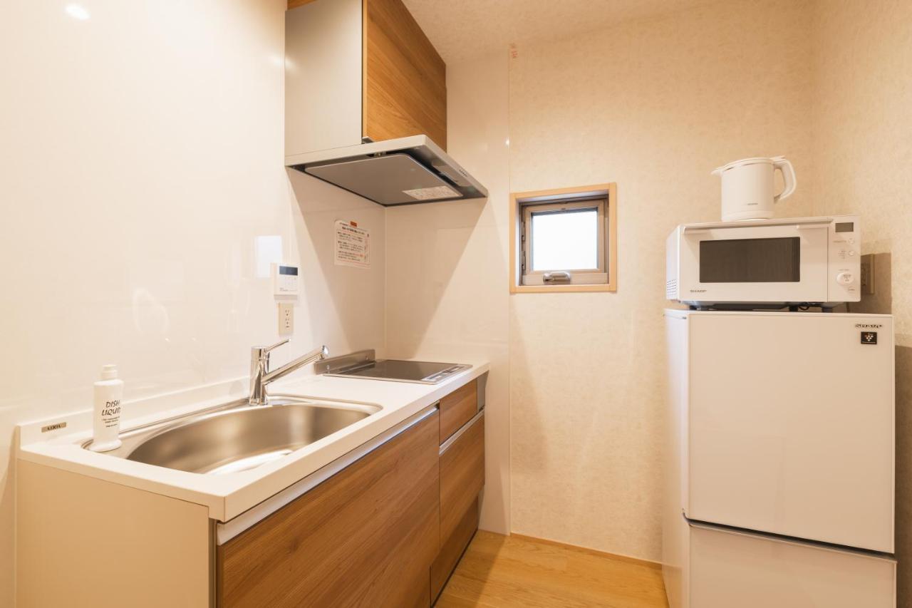 Grand Base Hakata Gofuku Aparthotel Fukuoka  Bagian luar foto