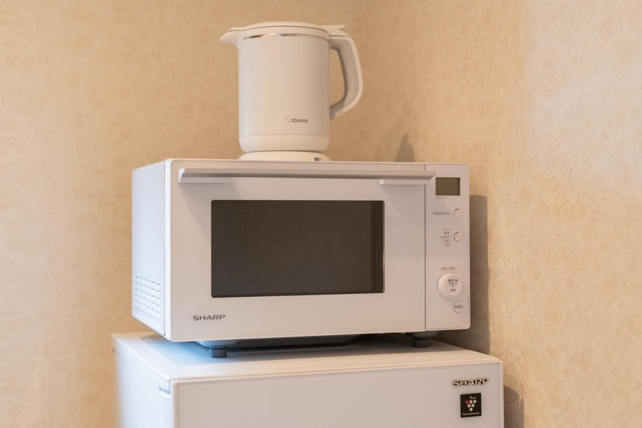 Grand Base Hakata Gofuku Aparthotel Fukuoka  Bagian luar foto